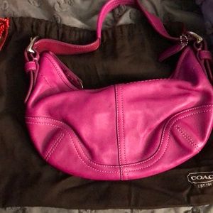 Pink mini Coach purse